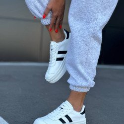 Кеди білі з чорними вставками