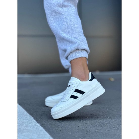 Кеди білі з чорними вставками