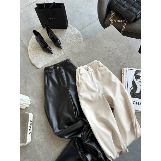 Шкіряні штани з вирізами