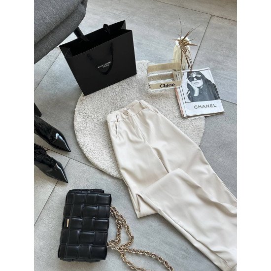 Шкіряні штани з вирізами