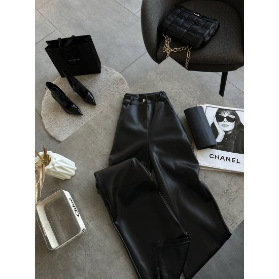 Шкіряні штани з вирізами